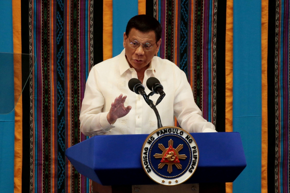 FILE PHOTO: Philippine President Rodrigo Duterte gestures during his fourth State of the Nation Address at the Philippine Congress in Quezon City, Metro Manila, Philippines July 22, 2019. REUTERS/Eloisa Lopez/File Photo