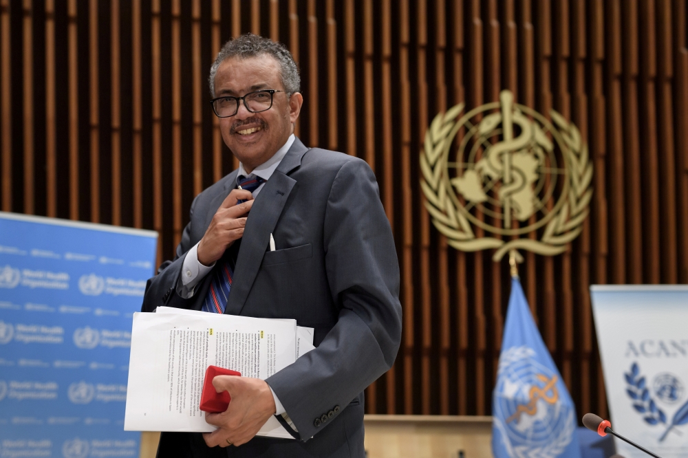 World Health Organization (WHO) Director-General Tedros Adhanom Ghebreyesus leaves a news conference organized by Geneva Association of United Nations Correspondents (ACANU) amid the COVID-19 outbreak, caused by the novel coronavirus, at the WHO headquart