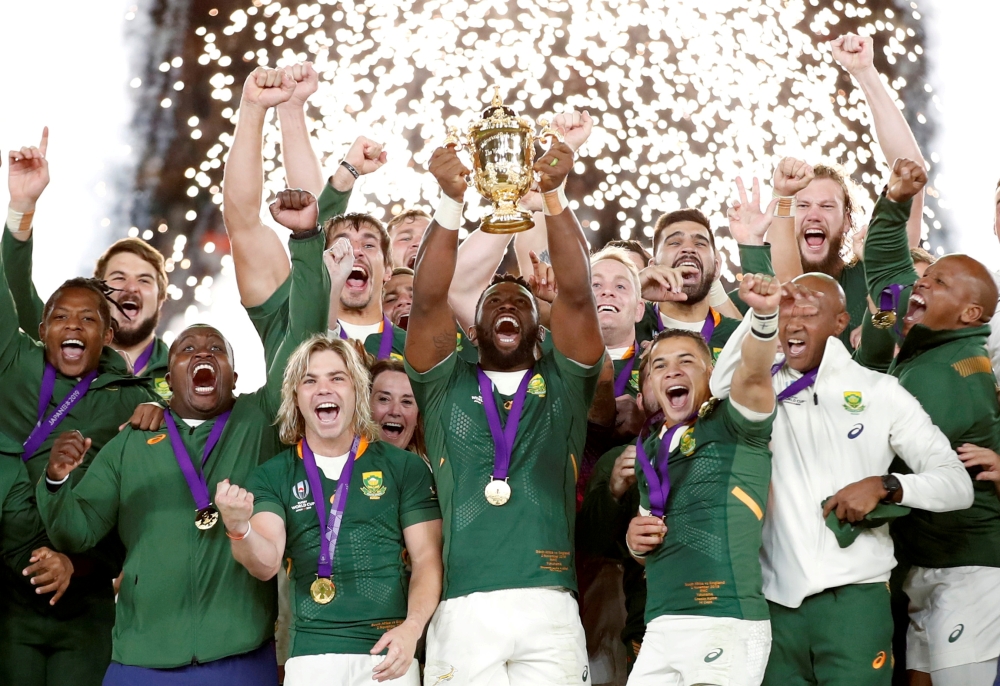 South Africa's Siya Kolisi celebrates with the Webb Ellis trophy after winning the Rugby Union World Cup Final at International Stadium Yokohama in Yokohama, Japan November 2, 2019 REUTERS/Matthew Childs/File Photo