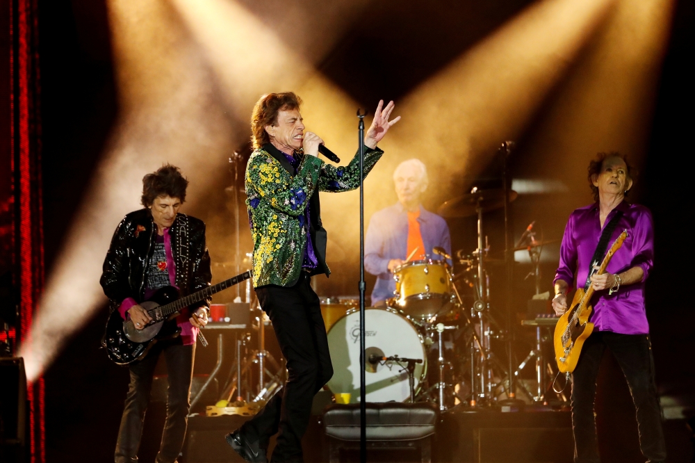 Mick Jagger of the Rolling Stones performs alongside band members Keith Richards, Charlie Watts and Ronnie Wood during their No Filter U.S. Tour at Rose Bowl Stadium in Pasadena, California, U.S., August 22, 2019. REUTERS/Mario Anzuoni/File Photo