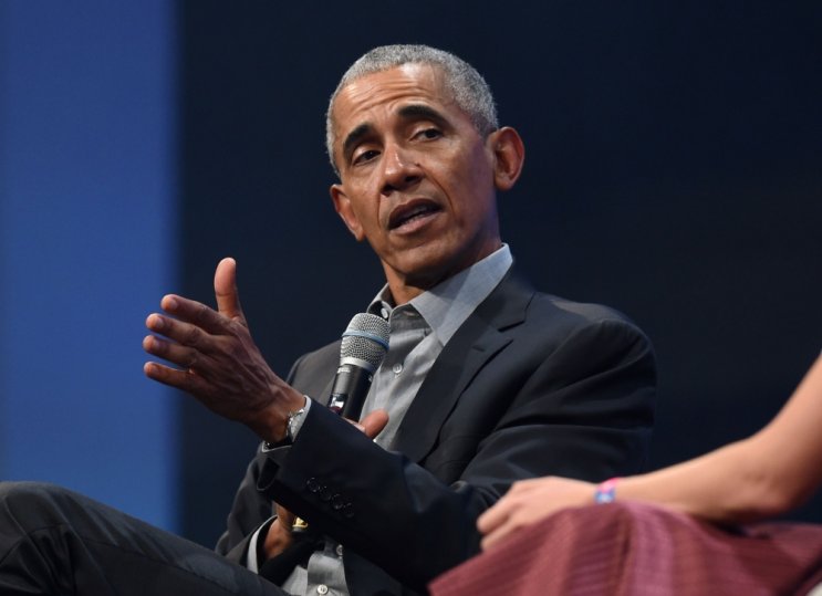 (FILES) In this file photo taken on September 29, 2019, former US President Barack Obama speaks during the 