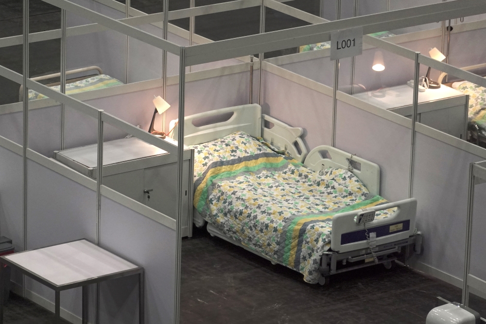 A bed is seen at an exhibition hall that has been converted into a makeshift treatment facility to treat patients of the coronavirus disease (COVID-19) in Hong Kong, China August 1, 2020. REUTERS/Pak Yiu