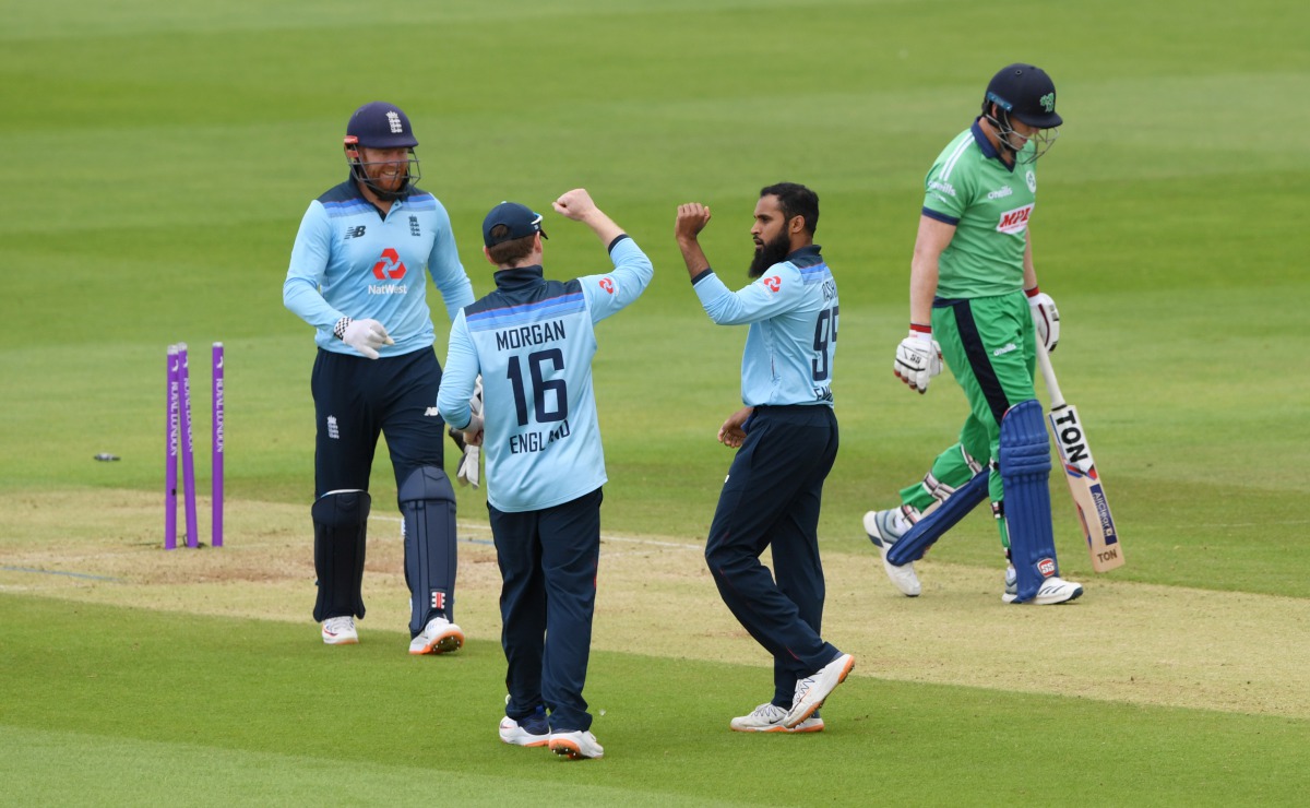 Ageas Bowl, Southampton, Britain - August 1, 2020 England's Adil Rashid celebrates bowling Ireland's Kevin O'Brien, as play resumes behind closed doors following the outbreak of the coronavirus disease (COVID-19) Mike Hewitt/Pool via REUTERS
