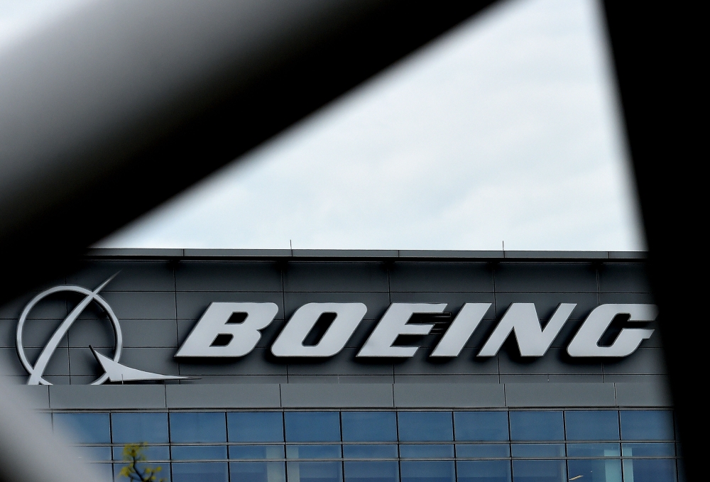 In this file photo taken on April 29, 2020 the Boeing regional headquarters is seen amid the coronavirus pandemic in Arlington, Virginia. / AFP / Olivier DOULIERY