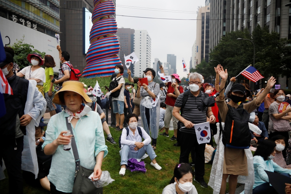 Members of conservative civic groups take part in an anti-government protest, as concerns over a fresh wave of the coronavirus disease (COVID-19) cases grow, in central Seoul, South Korea, August 15, 2020. (REUTERS/Kim Hong-Ji)