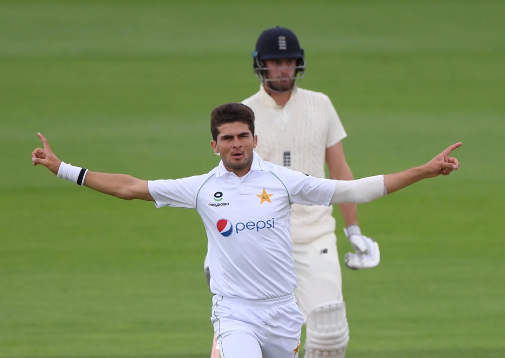 Cricket - Second Test - England v Pakistan - Ageas Bowl, Southampton, Britain - August 16, 2020 Pakistan's Shaheen Afridi celebrates after taking the wicket of England's Rory Burns, as play resumes behind closed doors following the outbreak of the coronav