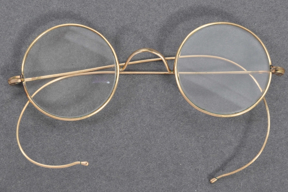 A handout picture released by East Bristol Auctions on August 19, 2020 shows a pair of glasses that once belonged to Indian independence icon Mohandas Karamchand Gandhi photographed at the action house in Bristol head of their sale. (AFP PHOTO / East Bris