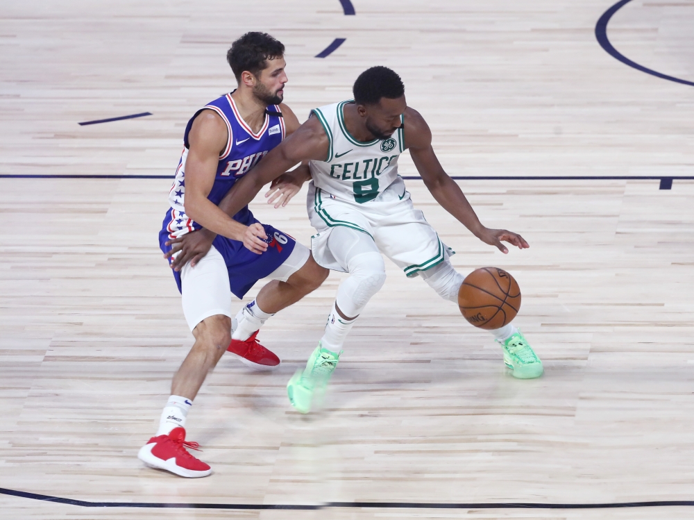 Boston Celtics guard Kemba Walker (8) dribbles as Philadelphia 76ers guard Raul Neto (19) defends during the second half in game four of an NBA basketball first-round playoff series at The Field House.  Kim Klement-USA TODAY Sports