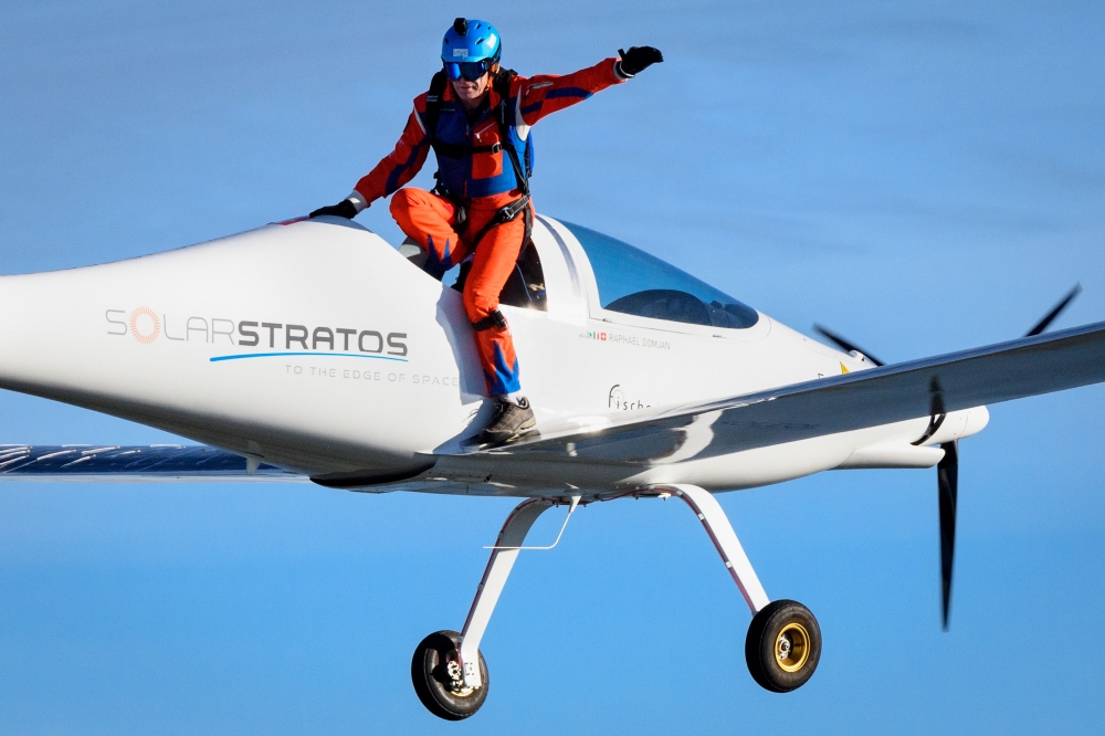 Initiator of sun-powered stratospheric SolarStratos plane project Raphael Domjan is seen during a successfully world record attempt by jumping with a parachute from a solar-powered plane on August 25, 2020 in Payerne, western Switzerland. / AFP / POOL / L