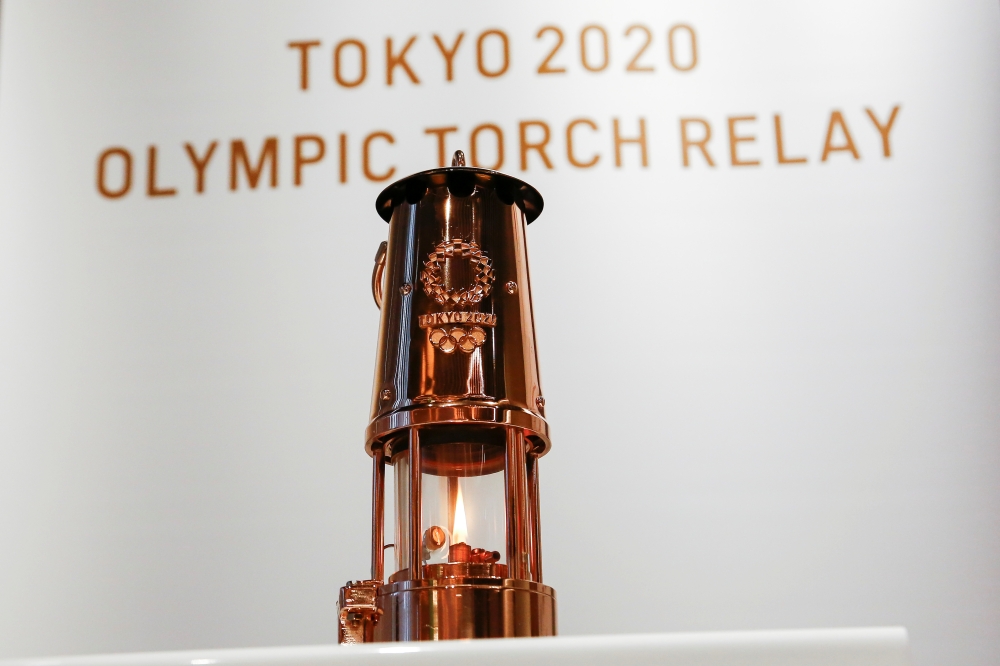 The Olympic Flame in lantern is seen on display at Japan Olympic Museum in Tokyo, Japan August 31, 2020. Rodrigo Reyes Marin/Pool via REUTERS