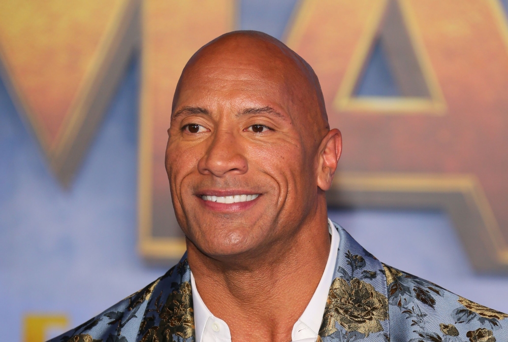 In this file photo taken on December 9, 2019 US actor Dwayne Johnson arrives for the World Premiere of 