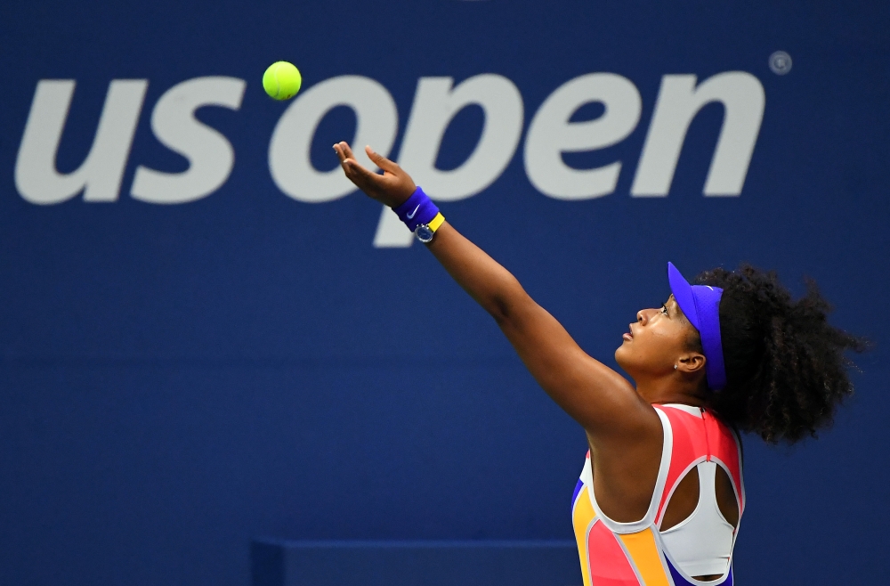 Sep 2, 2020; Flushing Meadows, New York, USA; Naomi Osaka of Japan serves the ball against Camila Giorgi of Italy on day three of the 2020 U.S. Open tennis tournament at USTA Billie Jean King National Tennis Center. Mandatory Credit: Robert Deutsch-USA TO