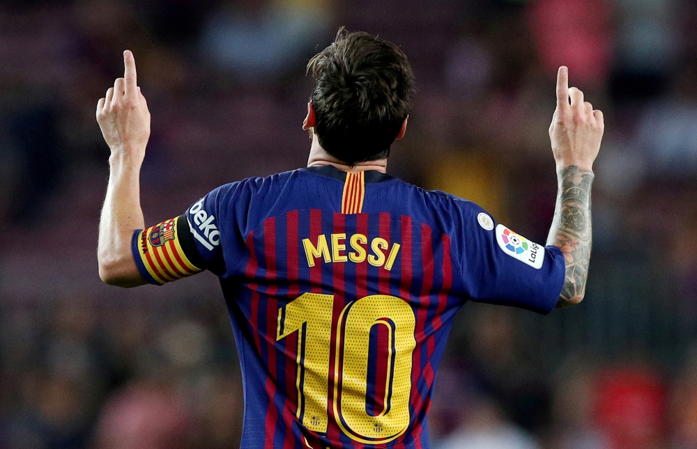 August 18, 2018 Barcelona's Lionel Messi celebrates scoring their third goal REUTERS/Albert Gea/File Photo