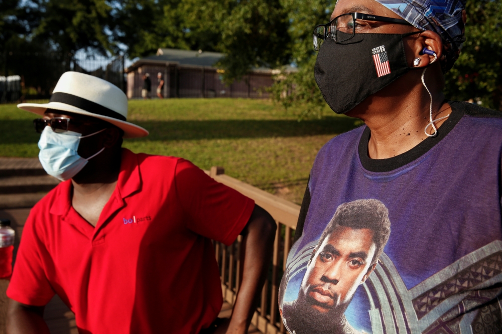 Jarvis Sullivan and Coletta Sullivan attend a community celebration for their cousin and late actor Chadwick Boseman in his hometown of Anderson, South Carolina, U.S. September 3, 2020. REUTERS/Chris Aluka Berry