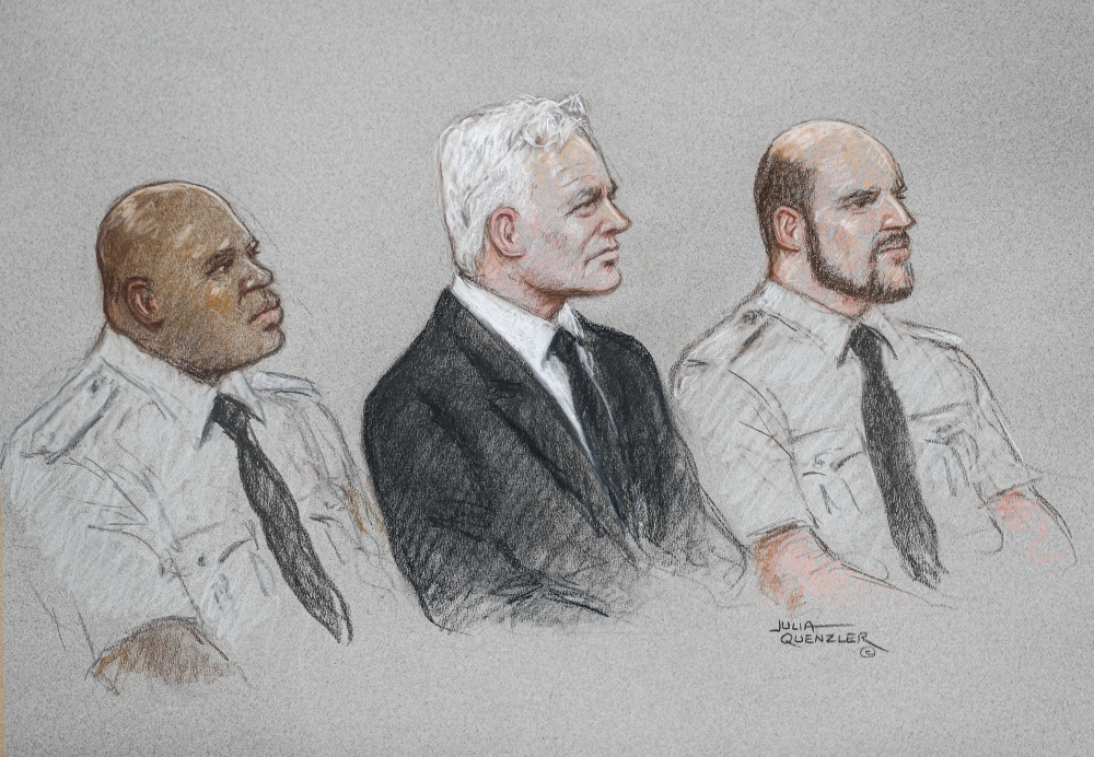 A courtroom sketch shows WikiLeaks founder Julian Assange during a hearing to decide whether he should be extradited to the United States, in London, Britain September 7, 2020 in this courtroom sketch. REUTERS/Julia Quenzler 