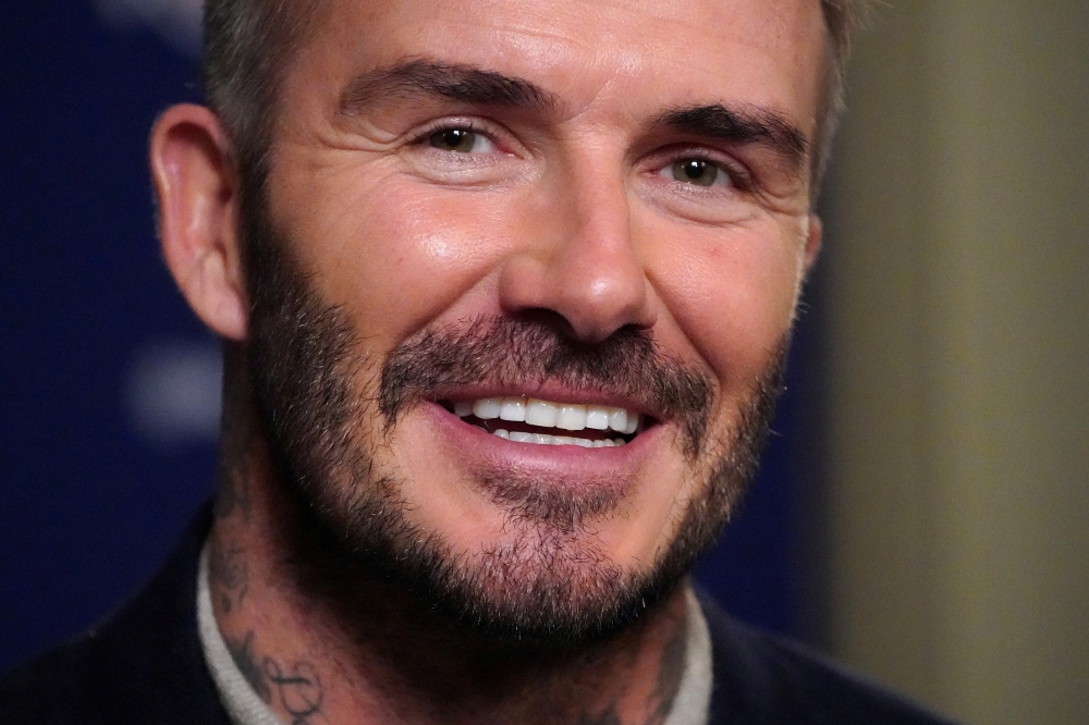 Former soccer player and MLS team owner David Beckham speaks during an interview in the Manhattan borough of New York City, New York, U.S., February 26, 2020. REUTERS/Carlo Allegri/File Photo