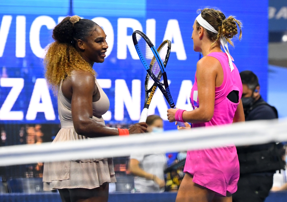 Sep 10, 2020; Flushing Meadows, New York, USA; Victoria Azarenka of Belarus, right, taps rackets with Serena Williams of the United States after defeating her in the women's singles semifinals match on day eleven of the 2020 U.S. Open tennis tournament at