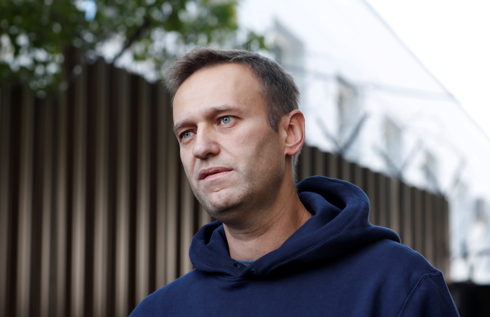 Russian opposition leader Alexei Navalny speaks with journalists after he was released from a detention centre in Moscow, Russia August 23, 2019. REUTERS/Evgenia Novozhenina/File Photo