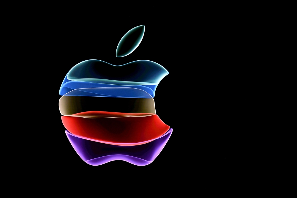 In this file photo the apple logo is projected on a screen before the start of a product launch event at Apple's headquarters in Cupertino, California, on September 10, 2019. Apple on September 8, 2020 fired off invitations to a September 15 online event 
