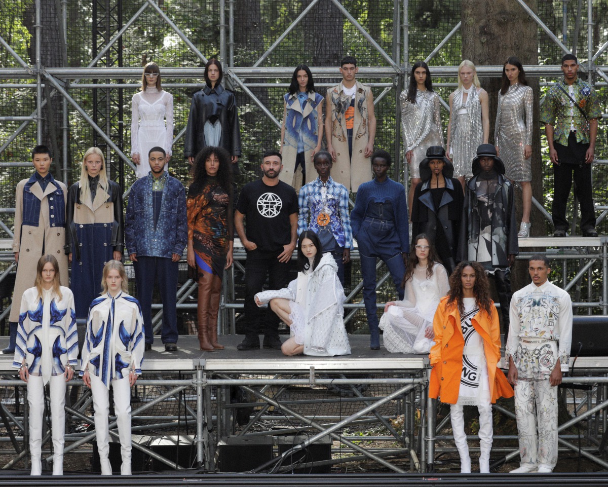 Designer Riccardo Tisci poses backstage with models wearing creations from the Burberry Spring/Summer 2021 Collection during the London Fashion Week, amid the coronavirus disease (COVID-19) outbreak, in an undisclosed location, Britain, September 17, 2020