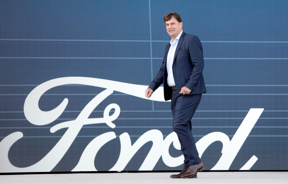 Ford Motor Co. CEO Jim Farley walks to speak at a news conference at the Rouge Complex in Dearborn, Michigan, U.S. September 17, 2020. REUTERS/Rebecca Cook/File Photo