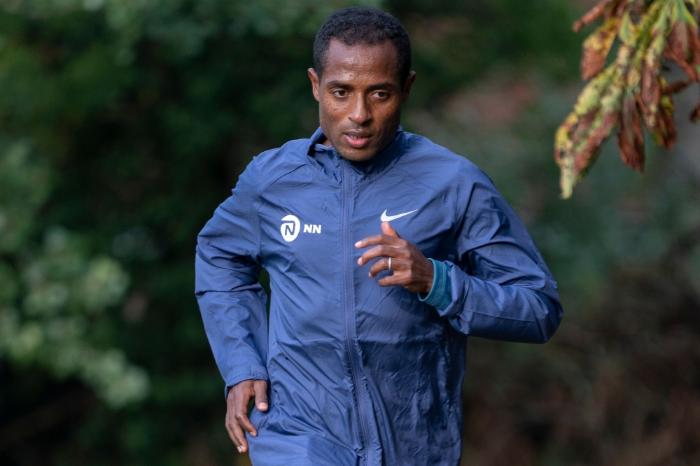 This file handout photograph taken on September 30, 2020 and released by the the London Marathon shows Ethiopia's Kenenisa Bekele training within the grounds of the official marathon hotel and biosecure bubble for the elite-only 2020 Virgin Money London M