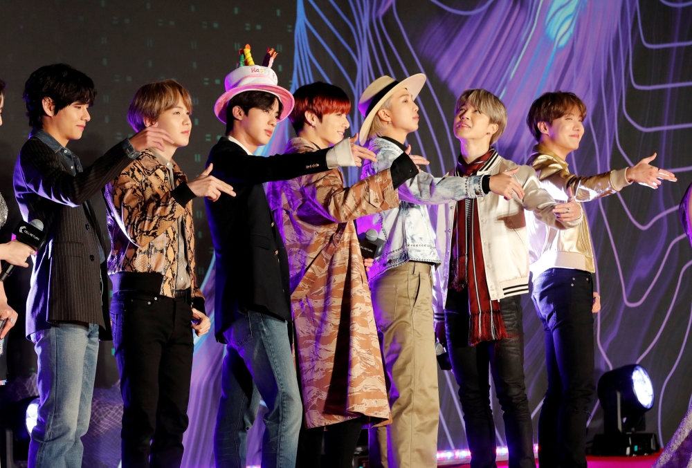 Members of South Korean boy band BTS pose on the red carpet during the annual MAMA Awards at Nagoya Dome in Nagoya, Japan, December 4, 2019. REUTERS/Kim Kyung-Hoon/File Photo