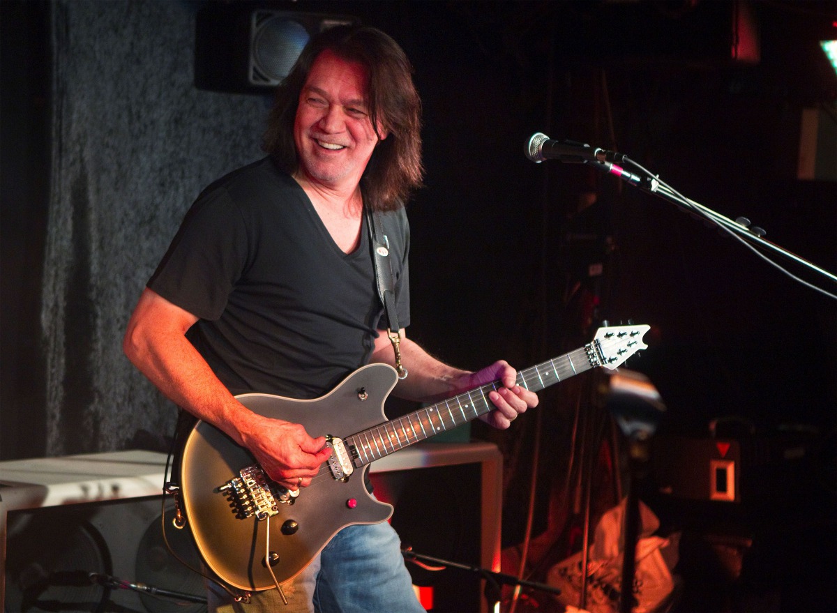 FILE PHOTO: Guitarist Eddie Van Halen performs during a private Van Halen show to announce the band's upcoming tour at Cafe Wha? in New York January 5, 2012. REUTERS/Lucas Jackson/File Photo
