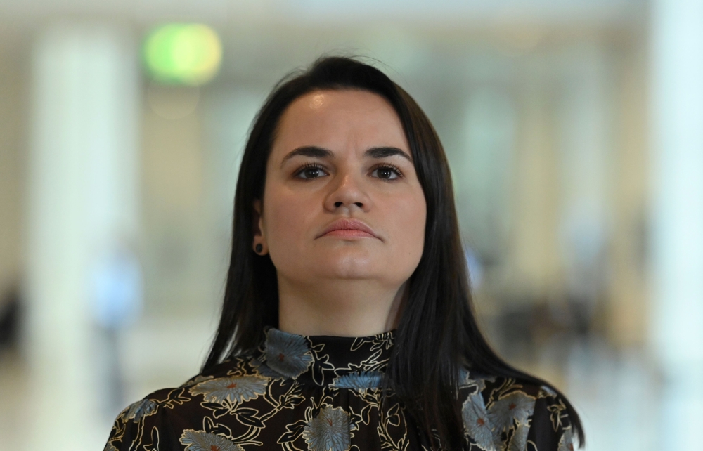 Belarusian opposition leader Svetlana Tikhanovskaya speaks to reporters after a meeting with Norbert Roettgen (not in picture), politician of Germany's conservative Christian Democratic Union (CDU) party, on October 7, 2020 in Berlin. / AFP / John MACDOUG