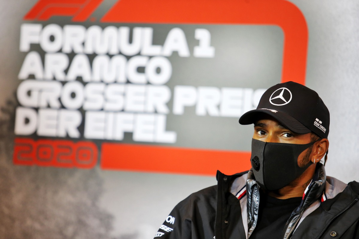 This handout photo taken and released on October 8, 2020 by the International Automobile Federation (FIA) shows Mercedes' British driver Lewis Hamilton during the drivers' press conference for the Formula One Eifel Grand Prix at the Nuerburgring circuit i