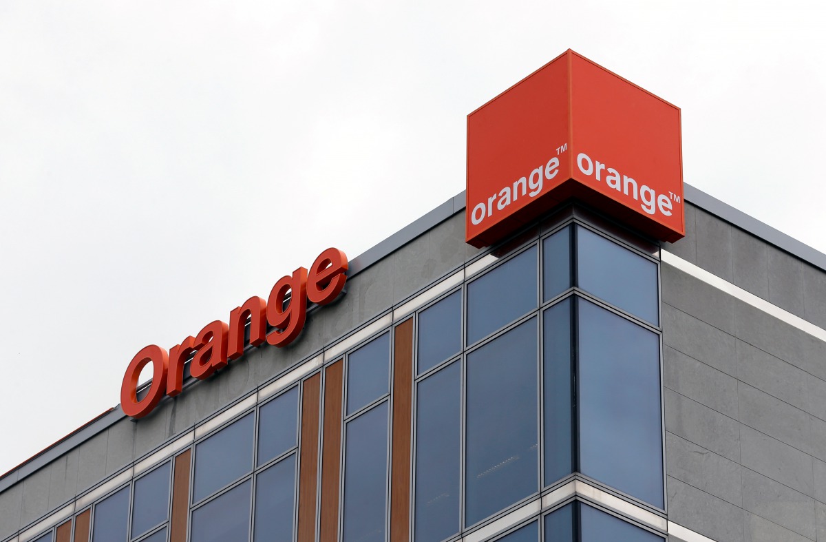 FILE PHOTO: The logo of French telecom operator Orange is pictured on the facade of the Belgian unit in Brussels, Belgium, May 10, 2016.REUTERS/Francois Lenoir/File Photo
