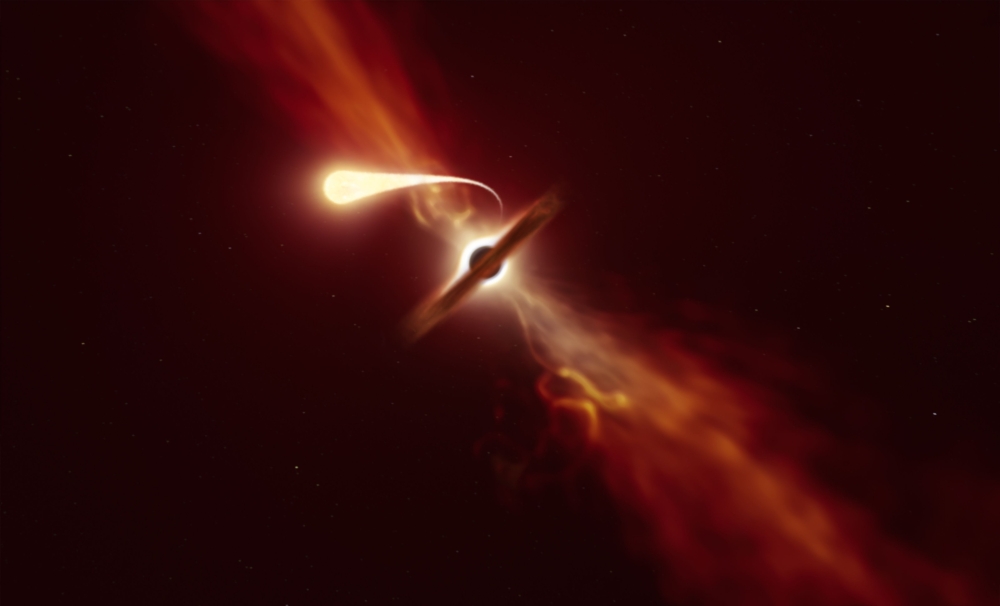 This handout picture released by The European southern Observatory on October 12, 2020, shows an illustration depicting a star (in the foreground) experiencing spaghettification as it’s sucked in by a supermassive black hole (in the background) during a 