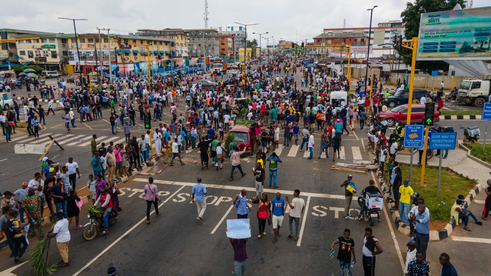 Protesters swarm the Allen Avenue roundabout during a demonstration in support of the ongoing protest against the unjust brutality of The Nigerian Police Force Unit, the Special Anti-Robbery Squad (SARS), at Obafemi Awolowo way, Ikeja, Lagos, on October 1