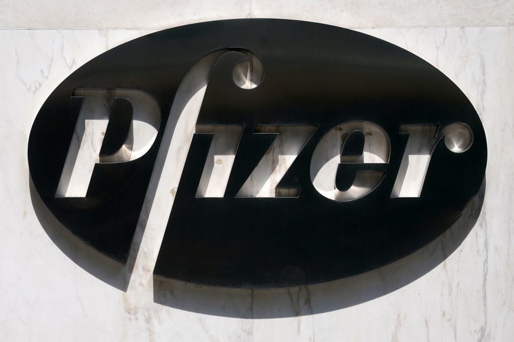 A sign is pictured outside Pfizer Headquarters in the Manhattan borough of New York City, New York, U.S., July 22, 2020. REUTERS/Carlo Allegri/File Photo