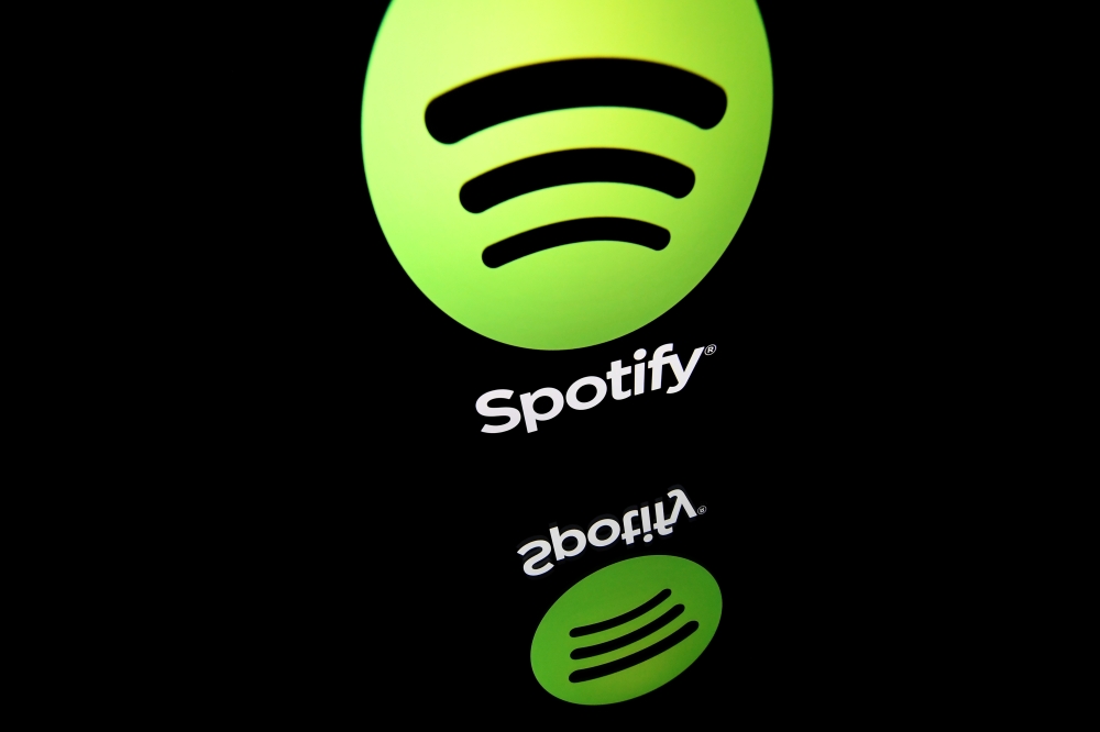 This file illustration taken on April 19, 2018 shows the logo of online streaming music service Spotify displayed on a tablet screen in Paris. Music streaming giant Spotify said Thursday, October 29, 2020 that its number of monthly active users passed the