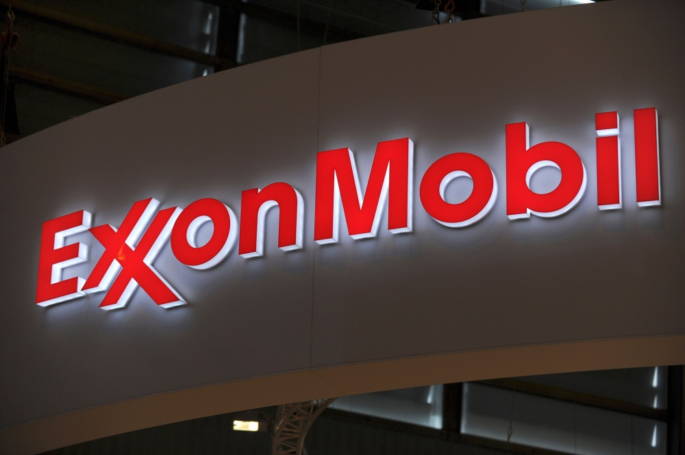 In this file photo taken on June 02, 2015, the logo of US oil and gas giant ExxonMobil during the World Gas Conference exhibition in Paris. Exxon Mobil reported another large quarterly loss on October 30, 2020, on a plunge in oil prices due to economic we