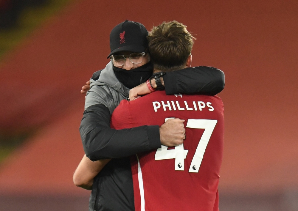 October 31, 2020 Liverpool manager Juergen Klopp celebrates after the match with Nathaniel Phillips Pool via REUTERS/Peter Powell