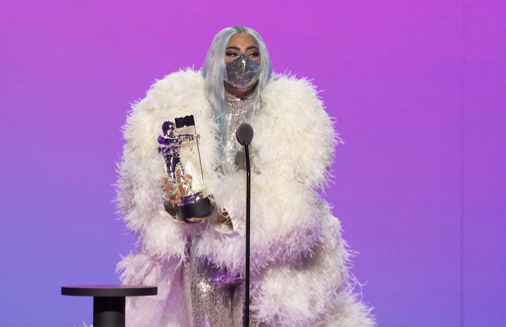 (FILES) In this file photo taken on August 30, 2020 this handout image released courtesy of MTV shows US singer-songwriter Lady Gaga accepting the award for Artist of the Year during the 2020 MTV Video Music Awards, being held virtually amid the coronavir
