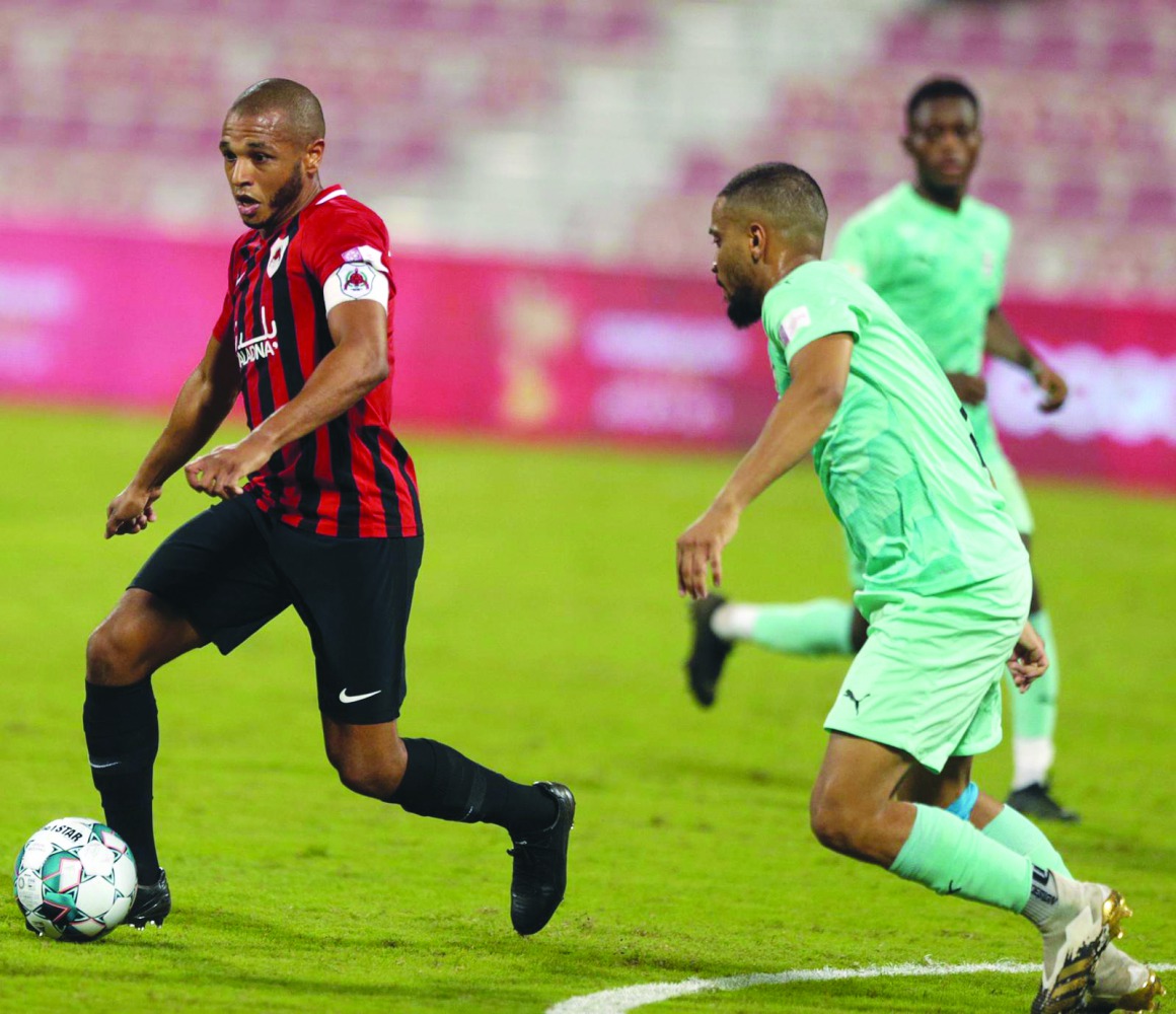 Al Rayyan's Yacine Brahimi (left) in action during yesterday's match.