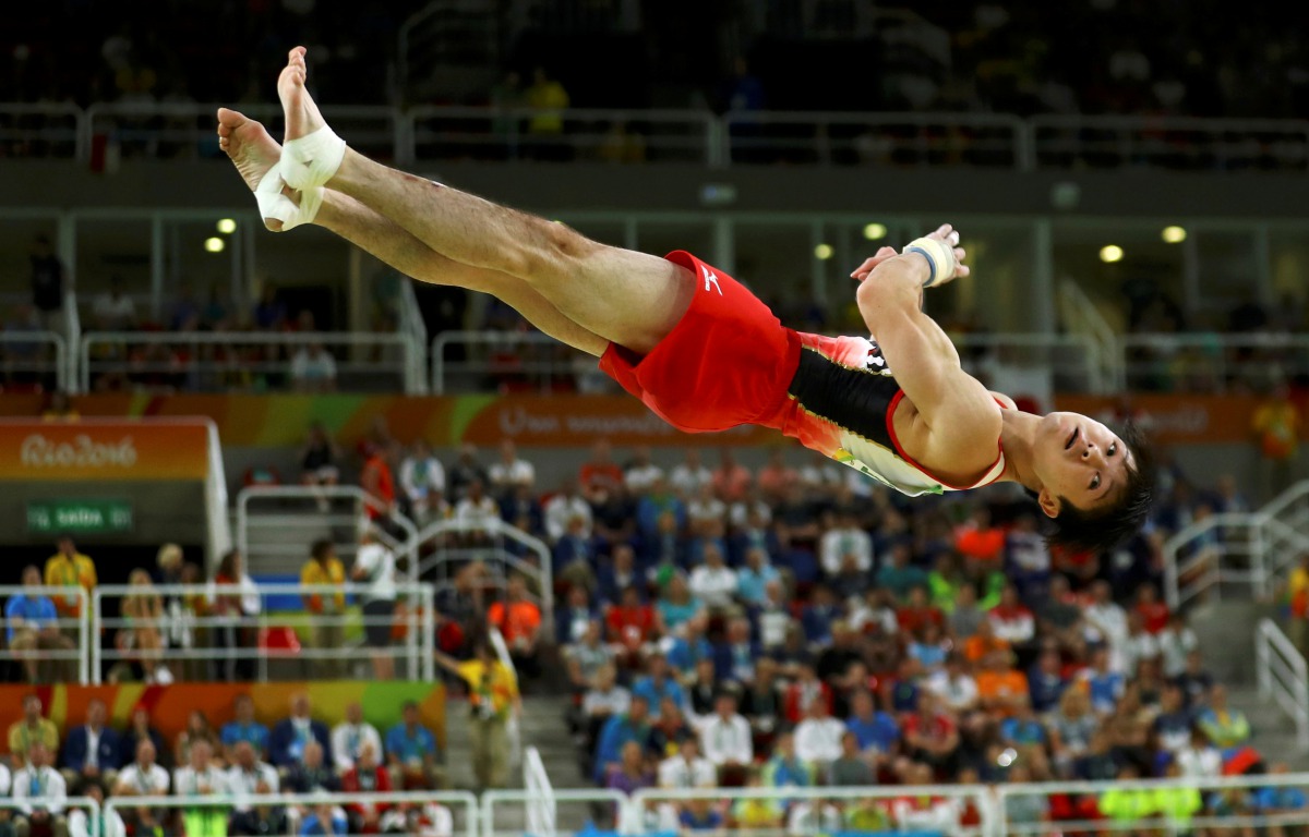 FILE PHOTO: 2016 Rio Olympics - Artistic gymnastics - Final - Men's Floor Final - Rio Olympic Arena - Rio de Janeiro, Brazil - 14/08/2016. Kohei Uchimura (JPN) of Japan competes on the floor. REUTERS/Mike Blake/File Photo
