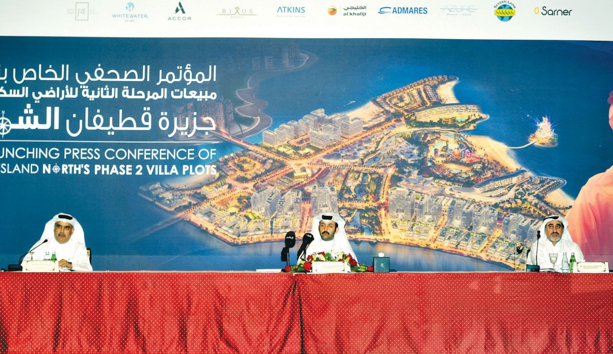 Sheikh Nasser bin Abdul Rehman Al Thani (centre), Managing Director of Qetaifan Projects; Nasser Hassan Al Ansari (left), Chairman of Just Real Estate, and Salman Jassim Al Darwish, Chairman and CEO of Al Boraq Automobiles, during the launch of Qetaifan P