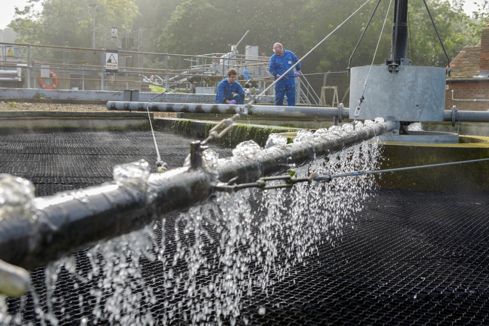Dr Francis Hassard and Nigel Janes sample partially treated wastewater for the coronavirus disease (COVID-19) as part of a study at the Cranfield University Wastewater Treatment Works in Cranfield in Cranfield, Britain in this undated photograph. Christia