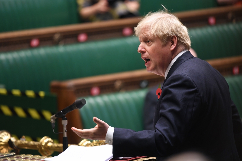 Britain's Prime Minister Boris Johnson speaking during the weekly Prime Minister's Questions (PMQs) in the House of Commons in London on November 11, 2020. AFP 