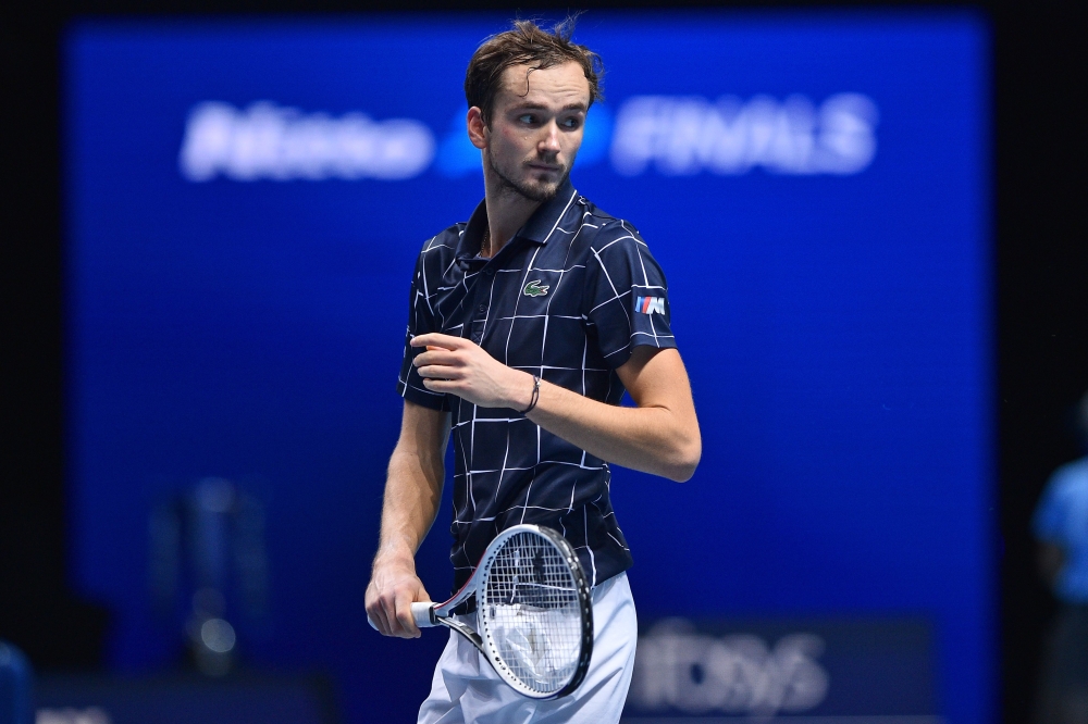 Russia's Daniil Medvedev reacts after his straight-sets win against Germany's Alexander Zverev in their men's singles round-robin match on day two of the ATP World Tour Finals tennis tournament at the O2 Arena in London on November 16, 2020. AFP / Glyn Ki
