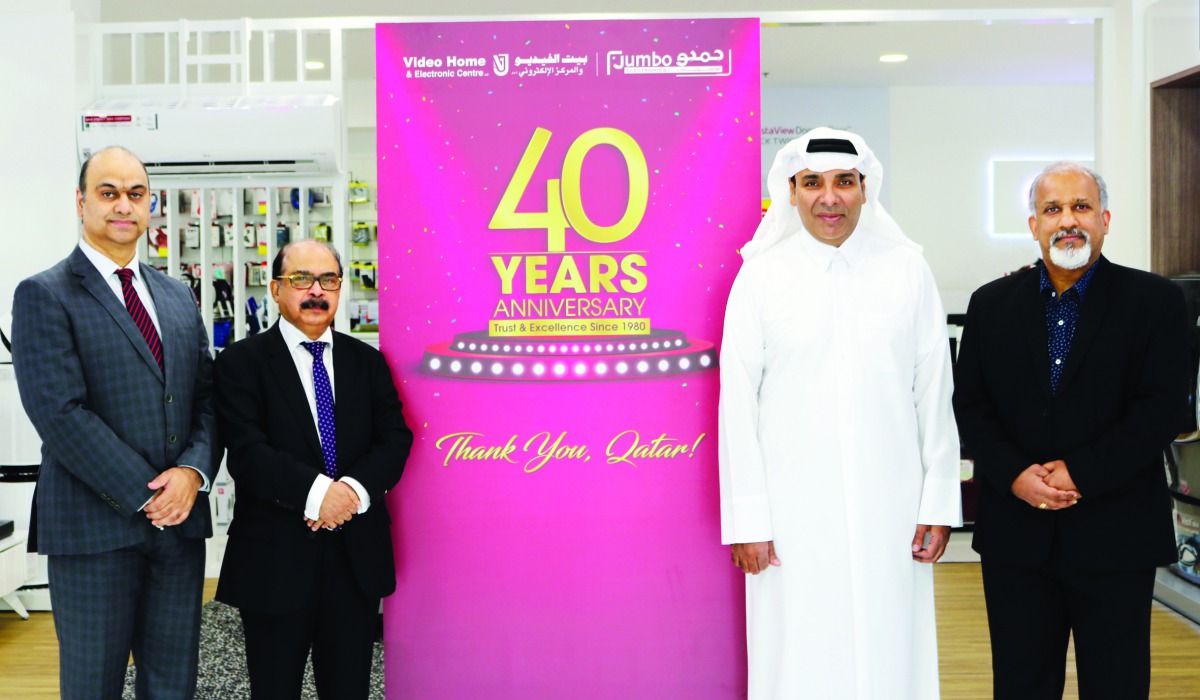 Sajed Jassim Mohammed Sulaiman, Vice-Chairman and Managing Director; C V Rappai, Director & CEO; Rohit Pandit, COO; and Ranjith P Abraham, Retail Head, pose for a group photo.
