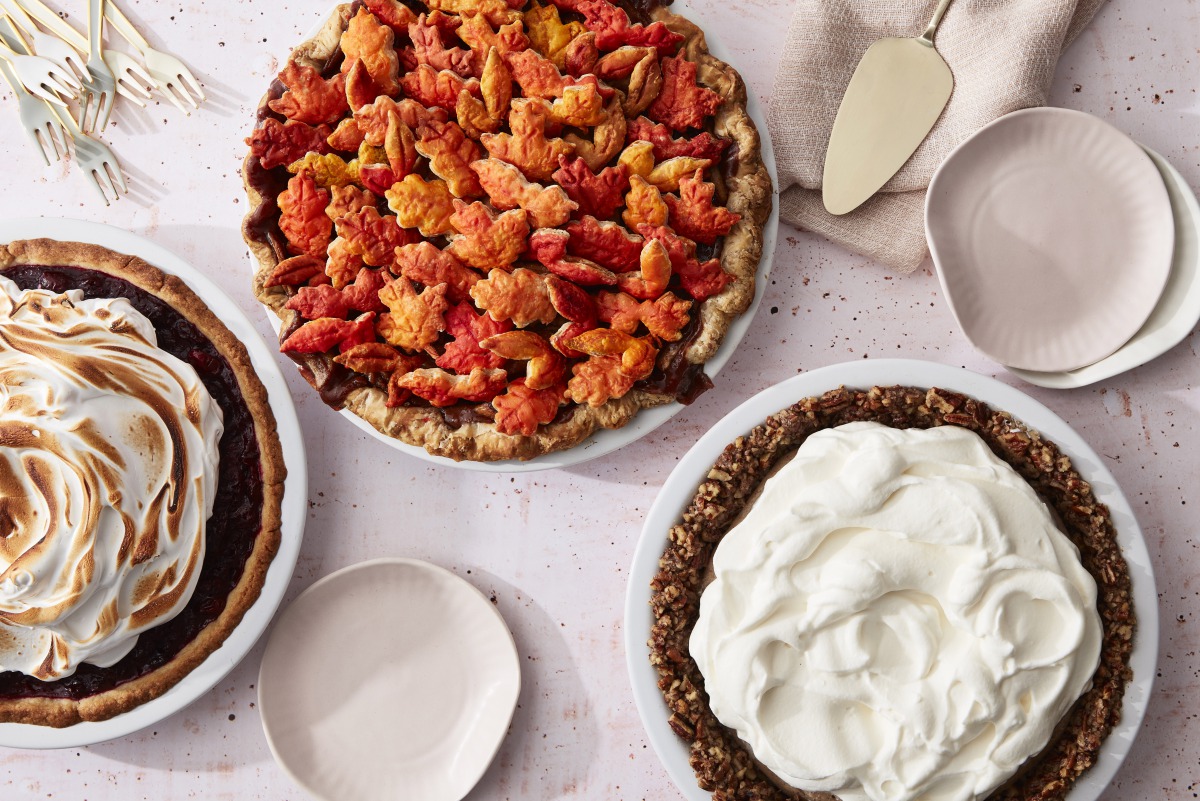 From left: Roasted Cranberry with Meringue topping in Press in Cookie Crust; Caramel Apple Pie With an All-Butter Crust and Painted Cutout Topping; Fall-Spice Pudding Pie with Whipped Cream and a Nut Crust. Photo by Mark Weinberg for The Washington Post.