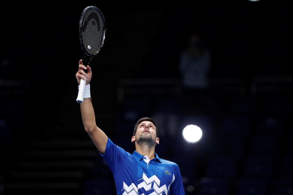 November 20, 2020 Serbia's Novak Djokovic celebrates winning his group stage match against Germany's Alexander Zverev Action Images via Reuters/Paul Childs