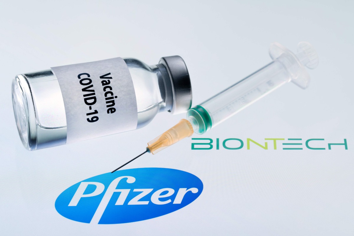 This illustration picture taken on November 23, 2020 shows a bottle reading 