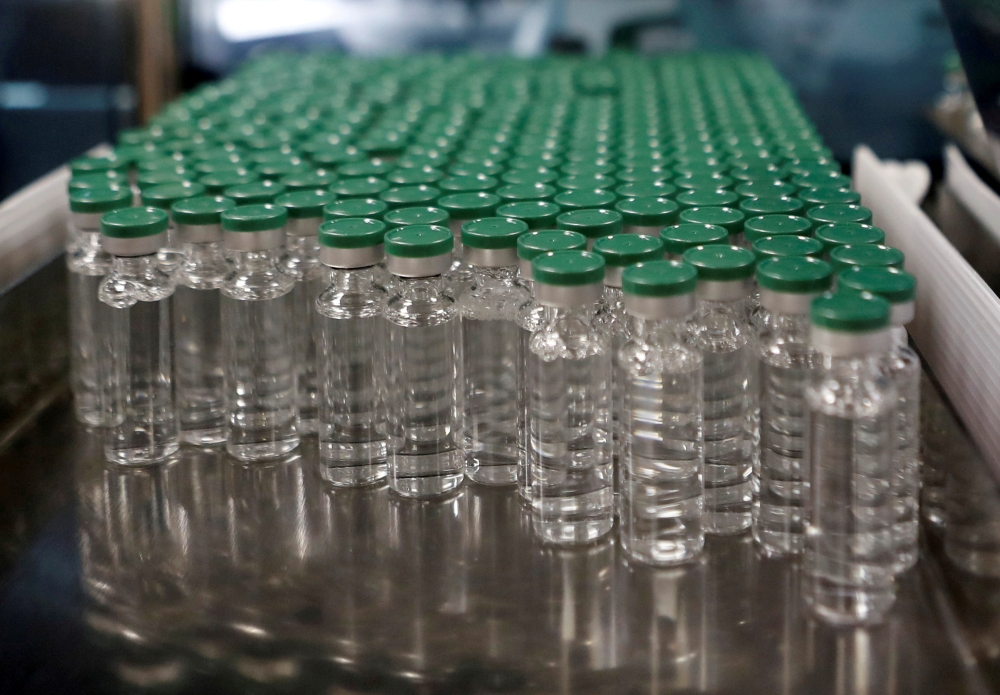 Vials of AstraZeneca's COVISHIELD, coronavirus disease (COVID-19) vaccine are seen before they are packaged inside a lab at Serum Institute of India, in Pune, India, November 30, 2020. (REUTERS/Francis Mascarenhas/File Photo)