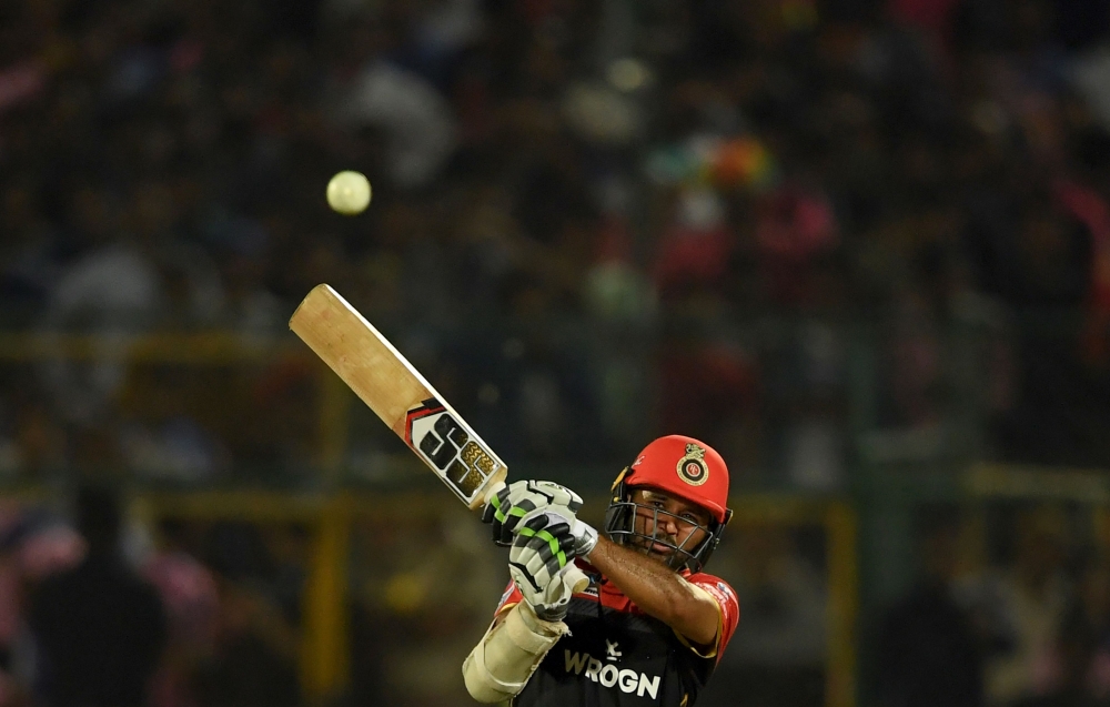 In this file photo taken on April 2, 2019 Royal Challengers Bangalore Parthiv Patel plays a shot during the 2019 Indian Premier League (IPL) Twenty20 cricket match between Rajasthan Royals and Royal Challengers Bangalore at the Sawai Mansingh Stadium in J